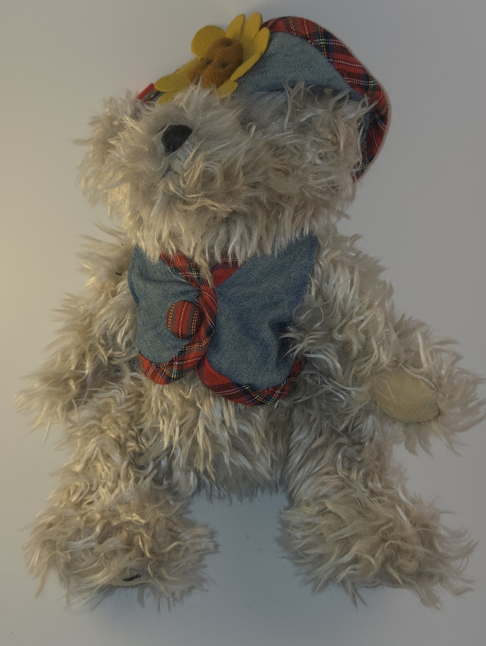 Plush Beige Teddy Bear with Denim Vest and Plaid Trim